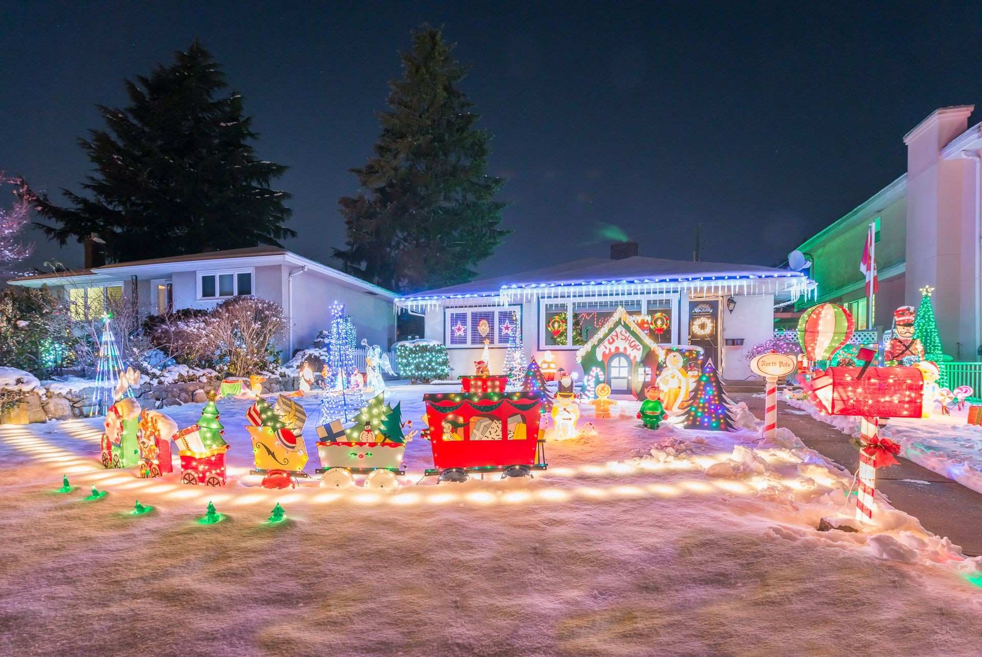 House decorated and lighted for Christmas and for New Year Eve at Night in Vancouver, Canada.